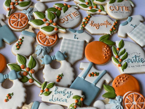 A little cutie is on the way, orange theme Baby shower cookies