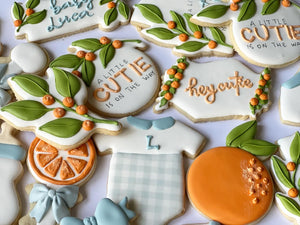 A little cutie is on the way, orange theme Baby shower cookies