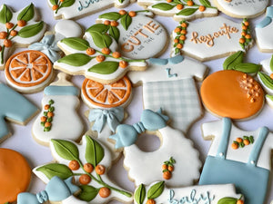 A little cutie is on the way, orange theme Baby shower cookies