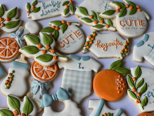 A little cutie is on the way, orange theme Baby shower cookies