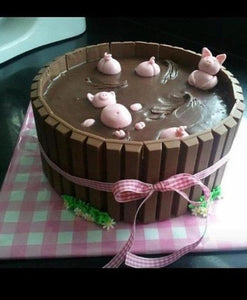Edible Fondant Pigs Cake Toppers for Swimming Pigs in Kit Kat Barrel Cake